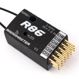 Close oblique front shot of R86 V2 receiver, large R86 logo, RadioMaster brand, BIND hole, LED window, 2.4GHz DC4.5-8.4V text, CH1~CH6 gold pin header